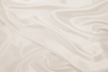 Smooth elegant golden silk or satin luxury cloth texture as wedding background. Luxurious...