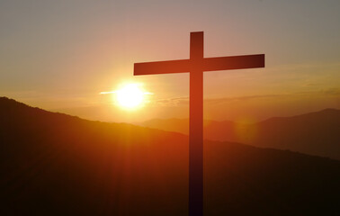 Christian concept the cross of jesus christ on the background at sunset religion