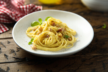 Traditional pasta Carbonara with egg and pork