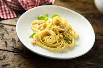 Traditional pasta Carbonara with egg and pork