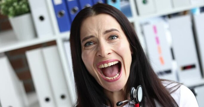 Woman doctor afraiding and screaming in clinic 4k movie slow motion