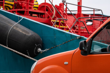 Car parked near ship in port