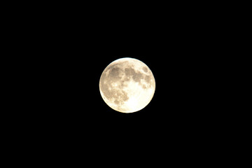 Obraz premium The New Full Moon in a Black Sky