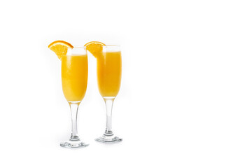 Orange mimosa cocktail isolated on white background