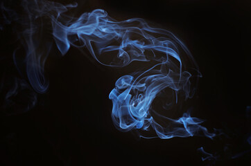 Abstract smoke backgound. Smoking. Smoke on the black background.