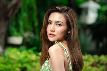 Fototapeta premium Portrait of young Asian beautiful cute girl in cafe, lifestyle concept.