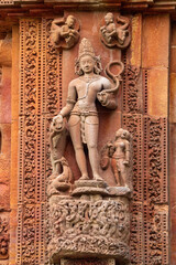 Lord Varuna carved stone sculpture on Rajarani Temple wall. 11th century Odisha style temple constructed dull red and yellow sandstone, Bhubaneswar, Odisha, India.