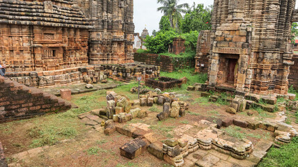 Fallen walls of Sukasari Temple and temple view, Bhubaneswar, Odisha, India. Built in sandstone...
