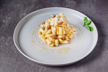 Tatar cookies with honey, pieces of dough and honey