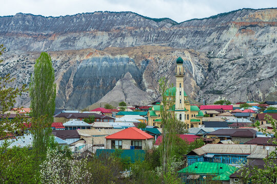 Mosque in spring in an authentic mountain village. Mosque in the center of a mountain village. Landscape and countryside of cityscape in Salta. Dagestan.