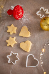 Merry Christmas and Happy Holiday. Christmas cookies close-up process cooking. Mom cooks with the children.