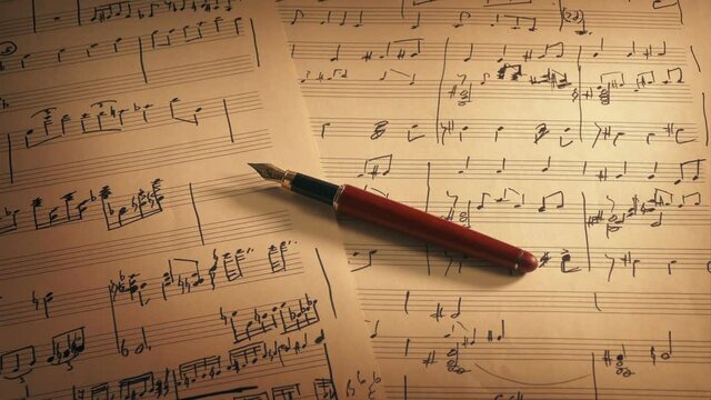Writing Music Pen On Sheets