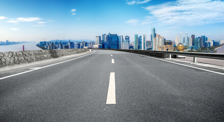 Fototapeta premium Empty asphalt road and city skyline and building landscape, China.