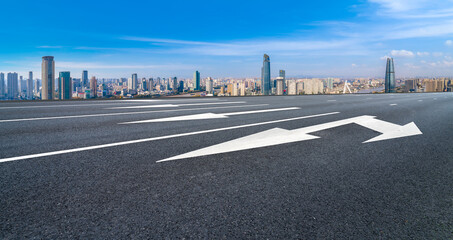 Naklejka premium Empty asphalt road and city skyline and building landscape, China.