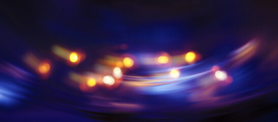 Bright abstract blurred background with bokeh. Blurred lights, neon glowing lines on a dark...