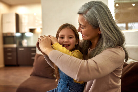 Heartwarming Moments Between Loving Grandmother And Grandaughter