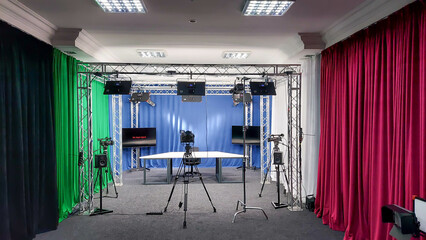 Camcorder in the background in the film studio. Type of photo studio. VideoBlog recording, media...