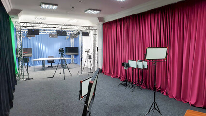 Camcorder in the background in the film studio. Type of photo studio. VideoBlog recording, media...