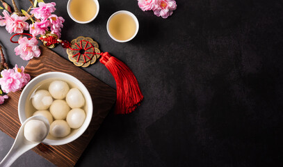 Fototapeta na wymiar Tang Yuan(sweet dumplings balls)., a traditional cuisine for lantern festival, Mid-autumn, Dongzhi (winter solstice ) and Chinese new year. 