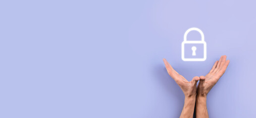Male hand holding a lock padlock icon.Cyber security network. Internet technology networking.Protecting data personal information on tablet. Data protection privacy concept. GDPR. EU.Banner