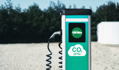 EV charging station for electric cars.Ecological and sustainable environment.Use electric cars to reduce air and emissions carbon dioxide pollution.Eco-friendly sustainable energy.