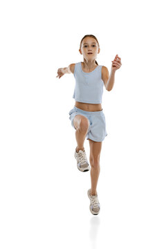 Front View Portrait Of Teen Girl Training, Running Isolated Over White Background