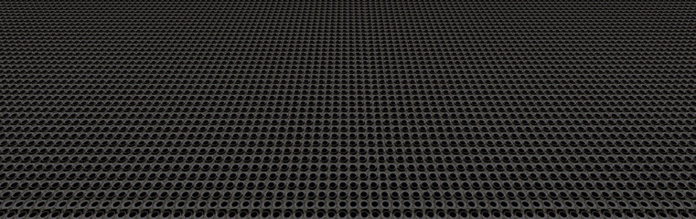 Black perforated metal plate shot in perspective