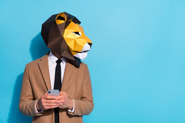 Profile side photo of freak guy in lion mask use smart phone text social-network discount look...