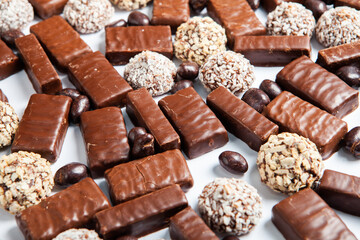 Assortment of delicious chocolate candies background. Chocolate candy isolated 