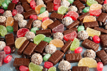Assortment of delicious chocolate candies background. Chocolate candy isolated 