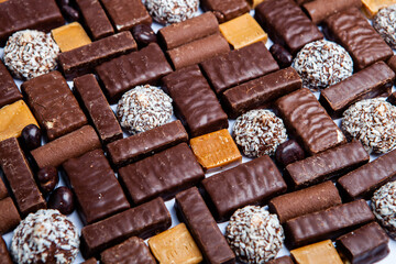 Assortment of delicious chocolate candies background. Chocolate candy isolated 
