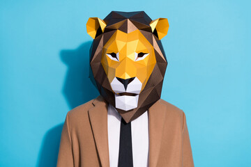Portrait of bizarre unusual man lion mask look incognito wear outerwear isolated over blue color...