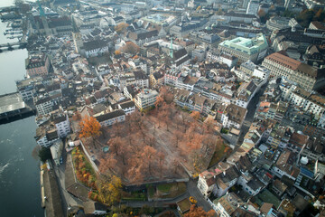 Aerial view of City of Zürich with river Limmat and medieval old town on a cloudy autumn day....