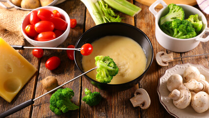 cheese fondue with various of vegetable