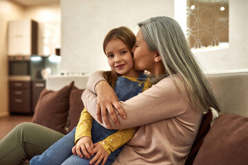 Delayed parenthood concept. Elder mother with daughter