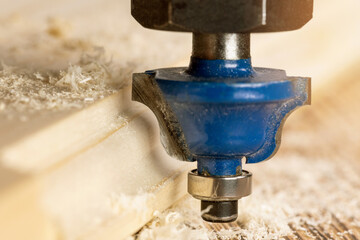 wood edge router bit closeup. furniture workshop and production - obrazy, fototapety, plakaty