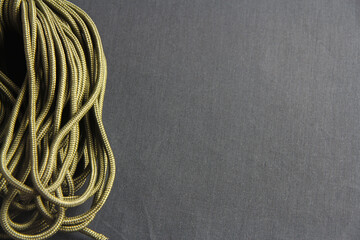 Paracord matting on a gray background for insertion