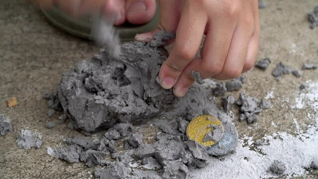kids enjoyed the archaeological dig at home during the early childhood holidays,oy plays an archaeologist excavated, training for dig fossil