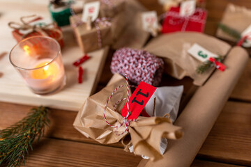 winter holidays and hobby concept - close up of christmas gifts for advent calendar at home