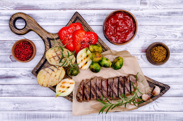 Fried beef steak with vegetables.