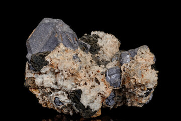 Macro stone mineral Galena on a black background