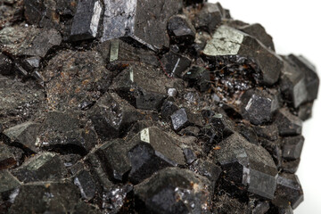 Macro stone mineral Melanite on a white background