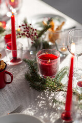 winter holidays, dinner party and celebration concept - close up of christmas table serving at home