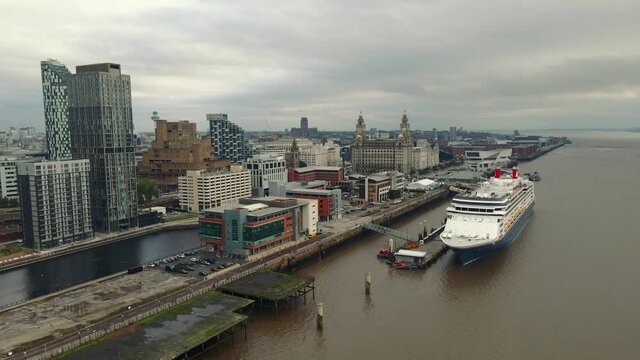Aerial drone view of Liverpool Skyline and the Mersey river. Waterfront in the evening in Liverpool City England