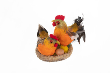 toy chicken with nest isolated on white background