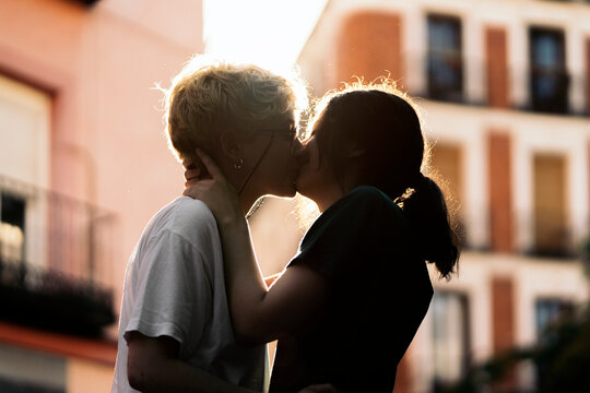 Young lesbian couple kissing