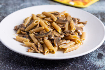 Pasta with mushrooms. Ideal dish for a vegan diet.