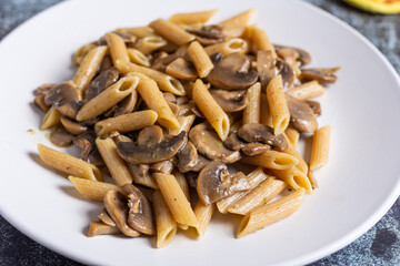 Pasta with mushrooms. Ideal dish for a vegan diet.