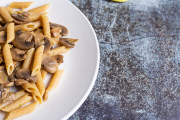 Pasta with mushrooms. Ideal dish for a vegan diet.