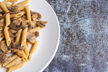 Pasta with mushrooms. Ideal dish for a vegan diet.